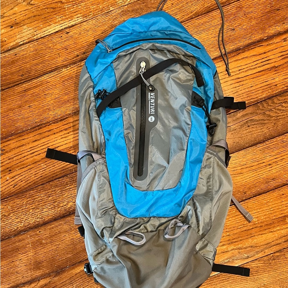 REI women’s hiking backpack teal and gray